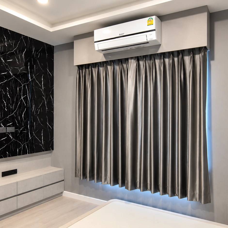 Bangkok Townhouse bedroom with grey pleated curtains