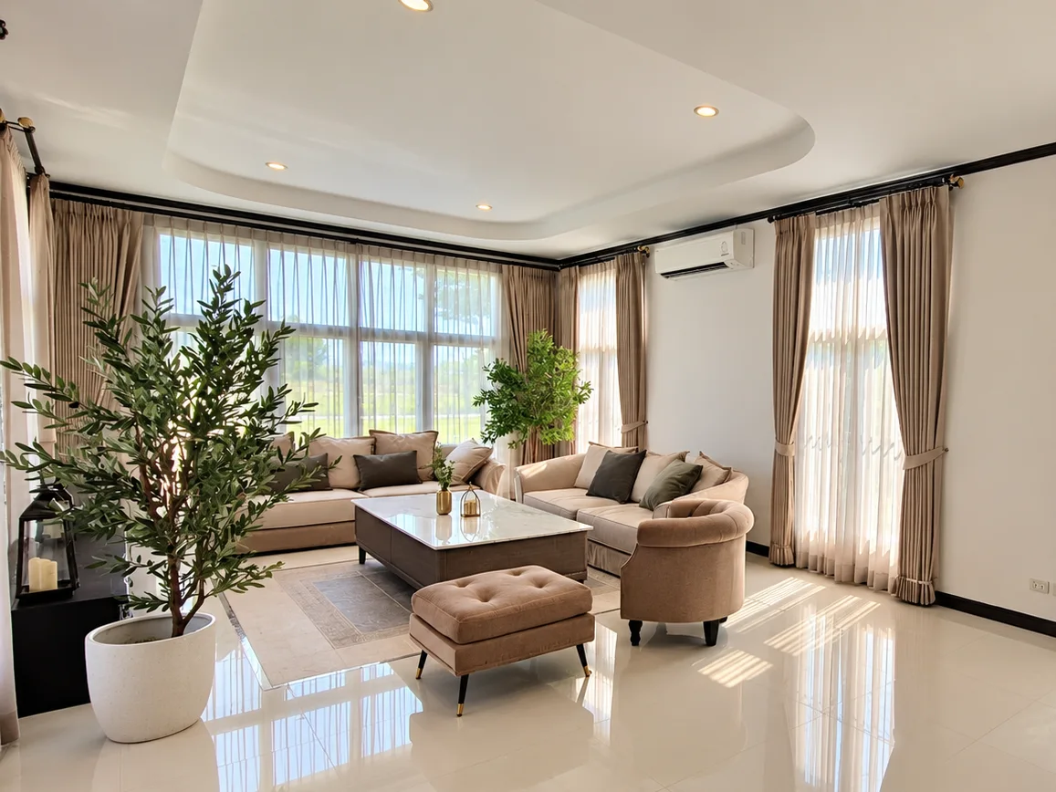 Khao Yai House living room with layered curtains