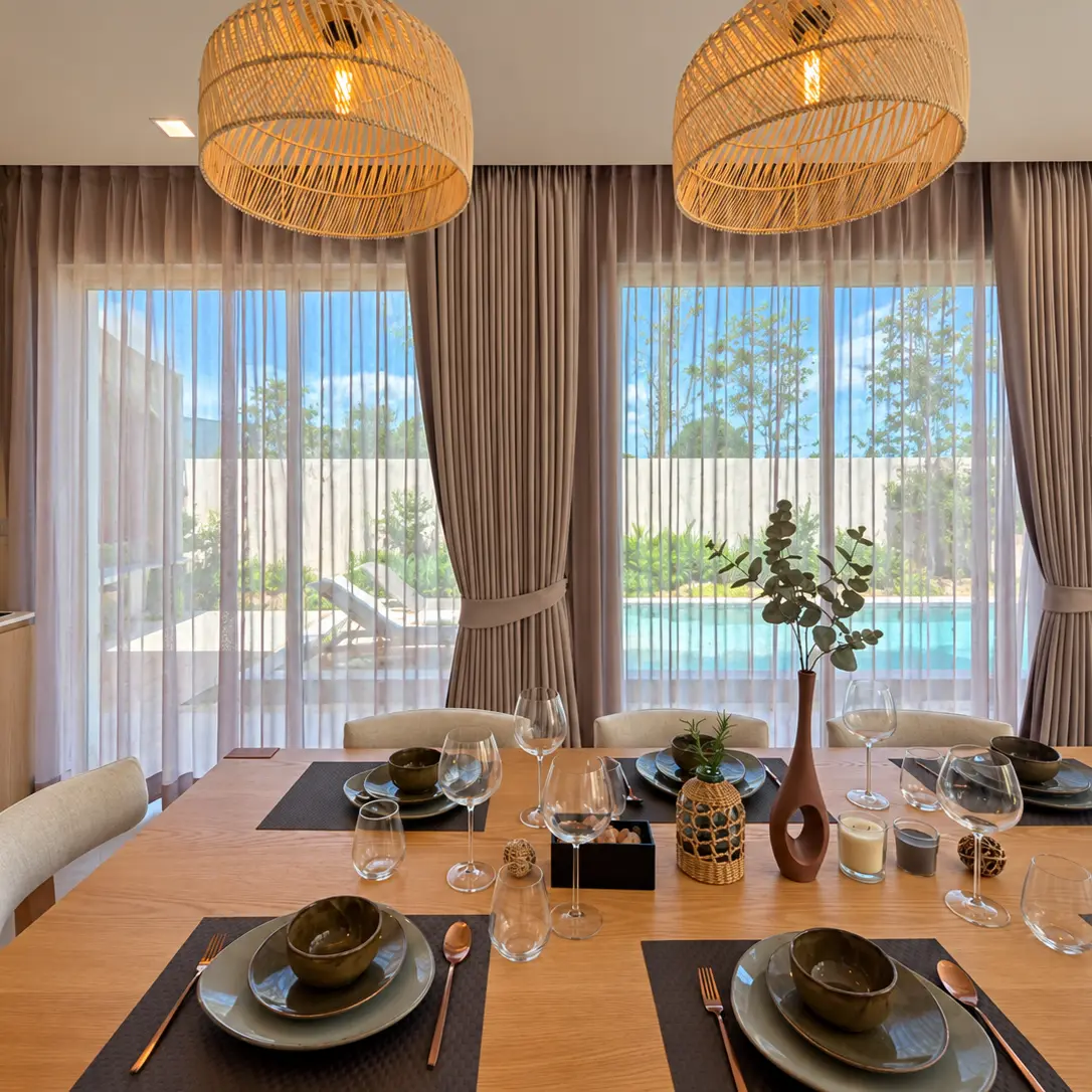 Khao Yai Pool Villa dining area with layered curtains